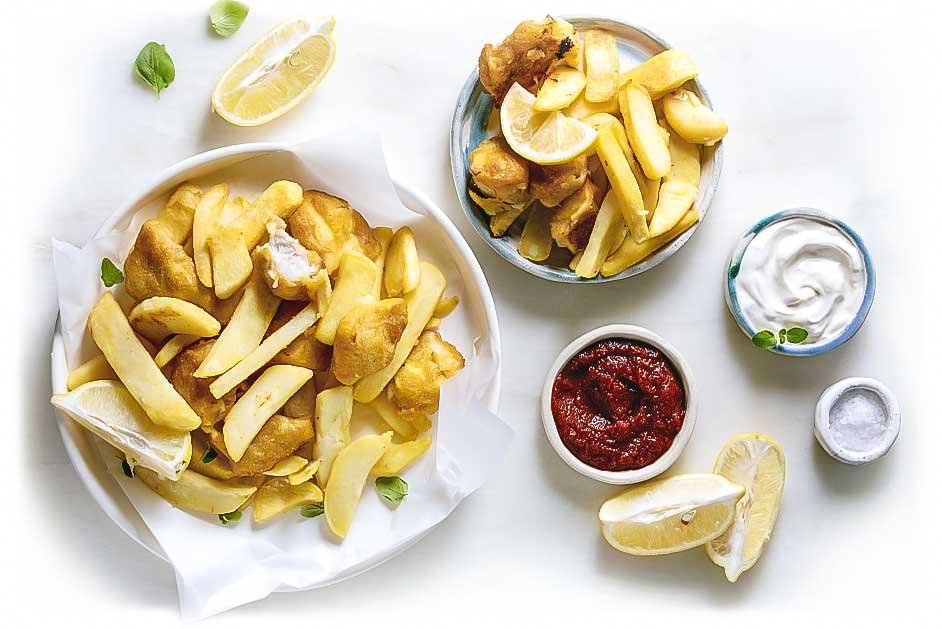 Fish and chips served with lemon and tartare sauce