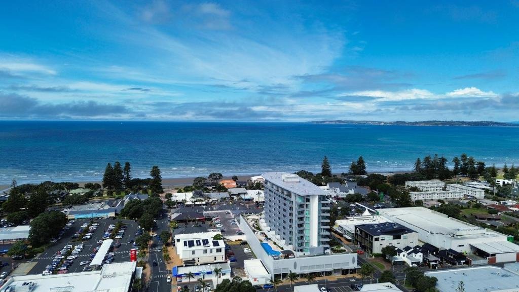 Marsden Suites Orewa and the nearby beach viewed from above