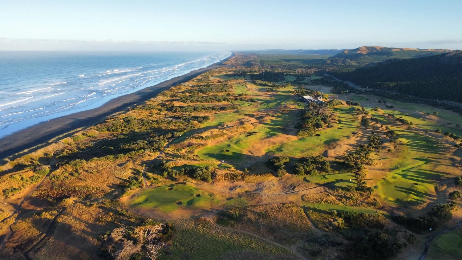 Aerial view of Muriwai Golf Club beside the Tasman Sea
