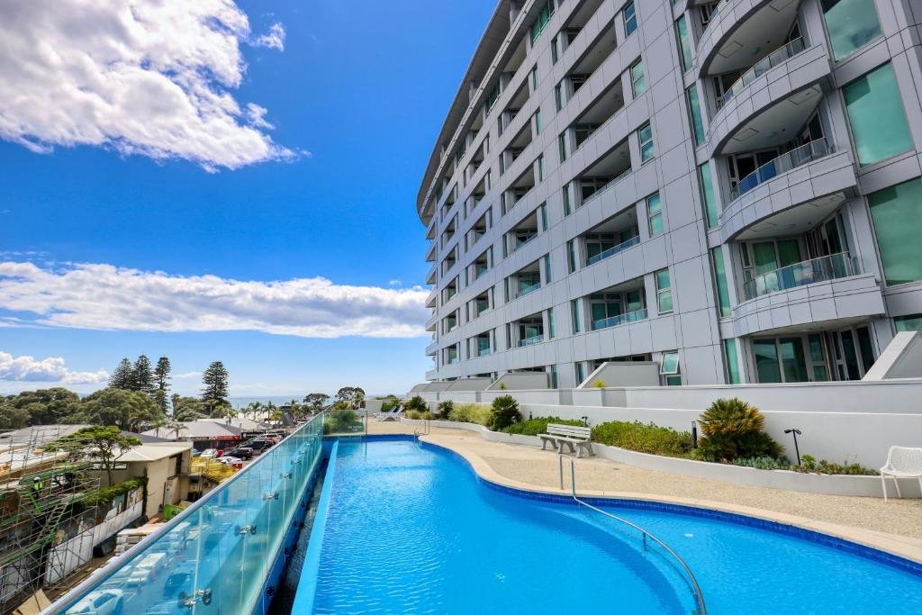Pool and balconies at Marsden Suites Orewa